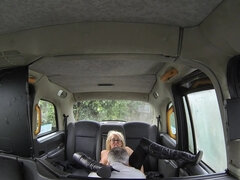 Blonde-haired mature with glasses gets fucked in the taxi