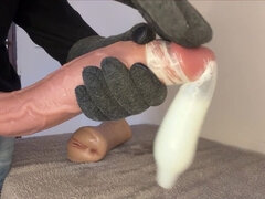 Cane Massaging the Huge Head of His Cock Until He Cums and Fills His Entire Condom!