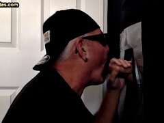 Mature DILF with moustache sucks hard in gloryhole