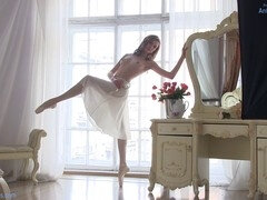 Stunning nude ballerina Annett A warms up for a shoot and strikes poses without a bra