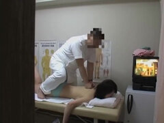 Nasty masseur rubbing his young client's pussy