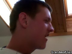 Blonde grandma takes two big cocks at once