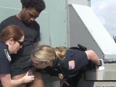 Busty cops take peeping tom to a rooftop when caught spying on white women