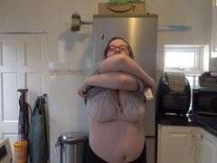 Mom with massive tits strips down in the kitchen