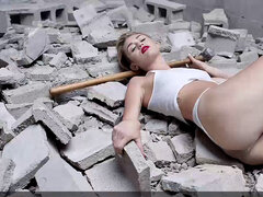 Miley Cyrus completely naked on the ball