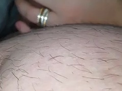 Wife helps her husband with an erection by jerking off under the blanket