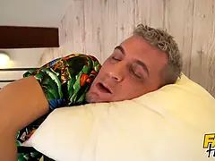 Faux hostel - surprise crevasse in couch makes chubby chick grin