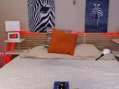 Blue-eyed and busty brunette camgirl teasing on webcam in sexy lingerie