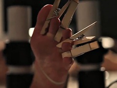 Lezdom handles clamps on tits and toes