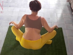 Regina Noir practices yoga in a gym wearing yellow tights and no panties, caught on webcam