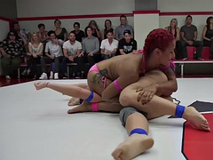 Wrestling winners ride losers in public in front of the crowd