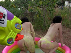 Liz Rainbow and Nerea Falco lesbian sex in the inflatable pool