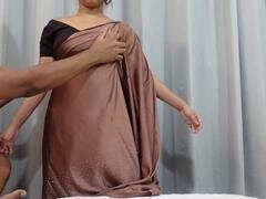 Hot Tamil aunty in a saree gets down with her big natural tits and curvy rear end