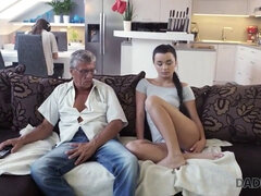 Daphne Klyde seduces her older man while he works on the computer and licks his pussy