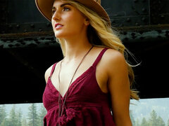 Sweet blond musician posing outdoor