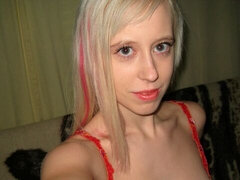 Cute-looking blonde Teena stimulates her wet hole on the cam