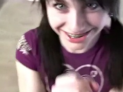 Melody jerks off close up while playing marbles