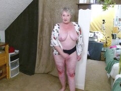 Mature woman with a hairy pussy in sexy underwear shows off her curves