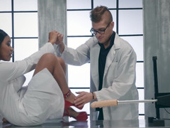 A sexy broad is licking the doctor in the laboratory after using the machine