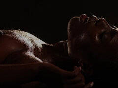 Bald-headed ebony gives head and gets fucked in the dark