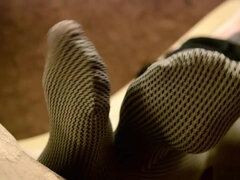 Mistress legs in opaque grey pantyhoses