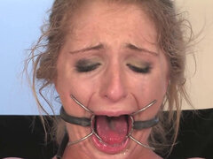 Vintage BDSM scene in which Harmony Rose dominates