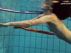 Sensational underwater show with Markova in stunning orange tights