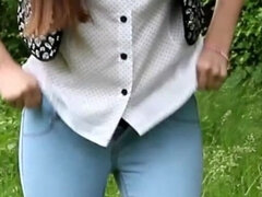 Diana Pee on a Rock in the Forest and Then She Dress Pulling up Her Tight Jeans