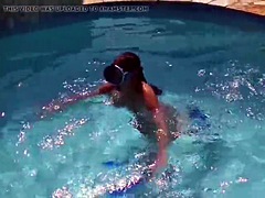 Hot brunette slut Candy swims underwater