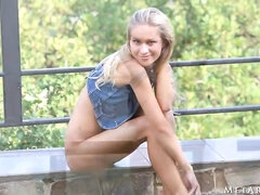 Insanely hot blonde babe Candice B poses naked outdoors and flaunts her perfect natural boobs