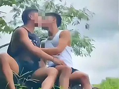 Handsome Asian Gay Couple Sucking Cock Outdoors