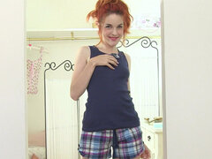 Redhead babe Amarna Miller has solo fun with her pussy