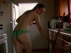 Jen cleans the kitchen