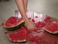 Busty MILF Presents Her Feet and Plays with a Watermelon