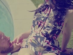 Affectionate vintage scene with Petra Blair and Brad Newman by the pool