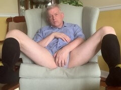 Older guy enjoying a solo session in gold toe socks
