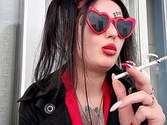 Sexy smoking fetish by Dominatrix Nika. Mistress smokes 2 cigarettes and blows smoke in your face. Sexy red lips