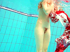 steaming polish red-haired swimming in the pool