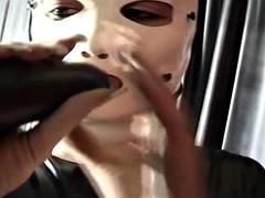 How horny you suck the dildo through your latex mask my cock we really hard