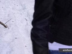 Barefoot Claudia is captured in the cold winter forest