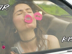 Messy Pink Lipgloss Marks on the Car Window