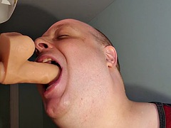 Rotating dildo with deep throat