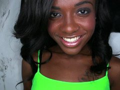 Black girl is teasing a sizeable fuck pole in a glory hole and additionally she smiles