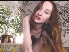 Alternative girl with long hair strips down for a sultry performance