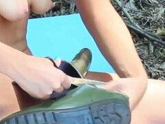 Sexy Baby Naked in the Woods Cut Her Rubber Boots with Sccissors Just After She Masturbated with Them
