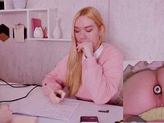 Im helping my stepsister with her homework, but shes too distracted by the vibrating plug in her ass!