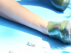 Naked Teen in the Woods Uses Scissors to Cut Her Latex Boots Into Confortable Shoes