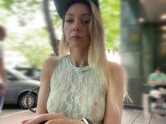 Anastasia Ocean gets off with daring public masturbation in a bustling café, wearing a see-through top and no panties