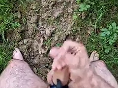 Leaving clothes to cum in the field