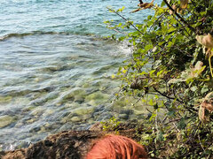 Redhead Mira Love Gets Sunscreen and a Hard Fuck on Nudist Beach